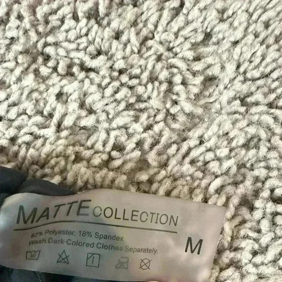 Black one piece bathing suit. - Picture 3 of 6